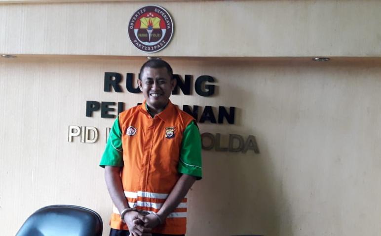 Tersangka Aris Munandar (38)